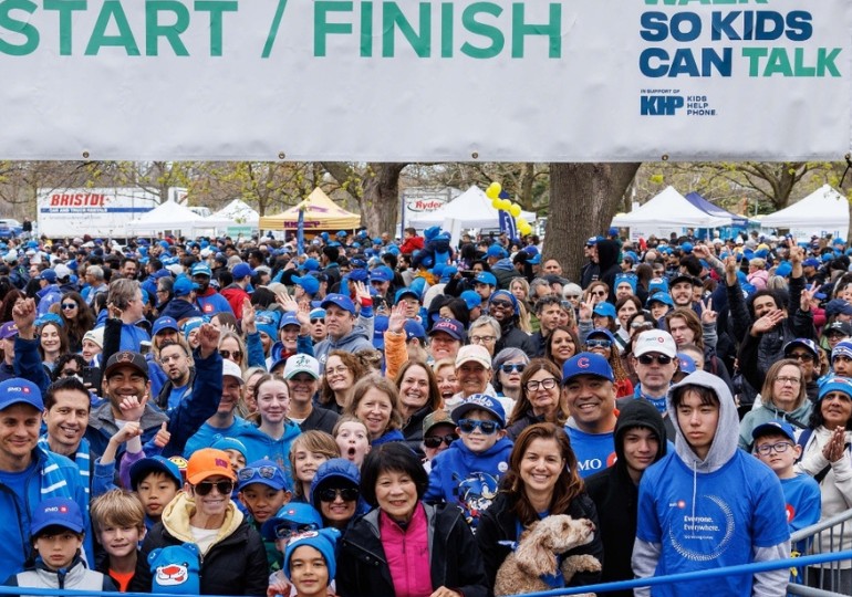An image of a group of people walking at events supporting youth such as BMO Walk so Kids Can Talk