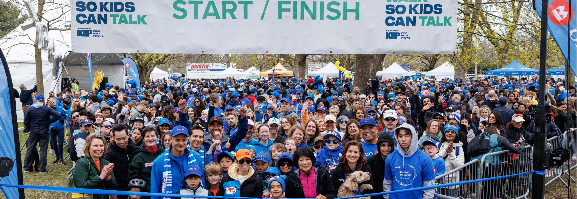 An image of a group of people walking at events supporting youth such as BMO Walk so Kids Can Talk