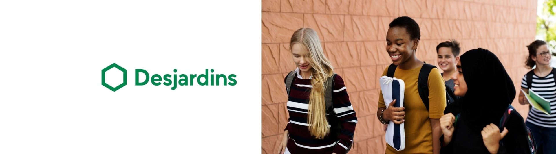 A group of young people with backpacks next to Desjardins' logo