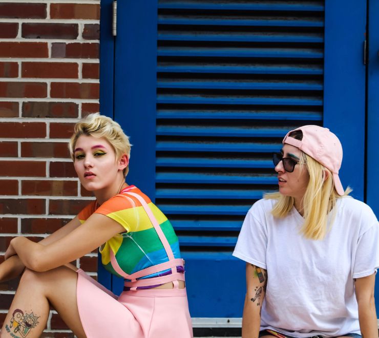 Two young people celebrating Pride.