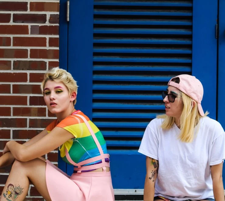Two young people celebrating Pride.