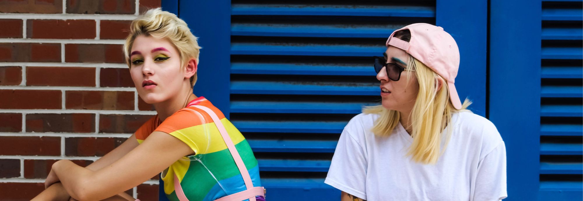 Two young people celebrating Pride.